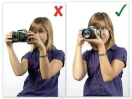 Holding a Camera.png