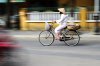woman-cycling-pan-blur-hoi-an.jpg