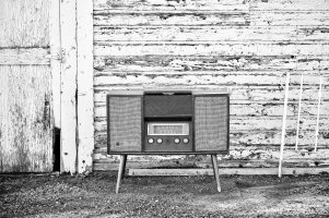 Old radio record player in back alley.jpg
