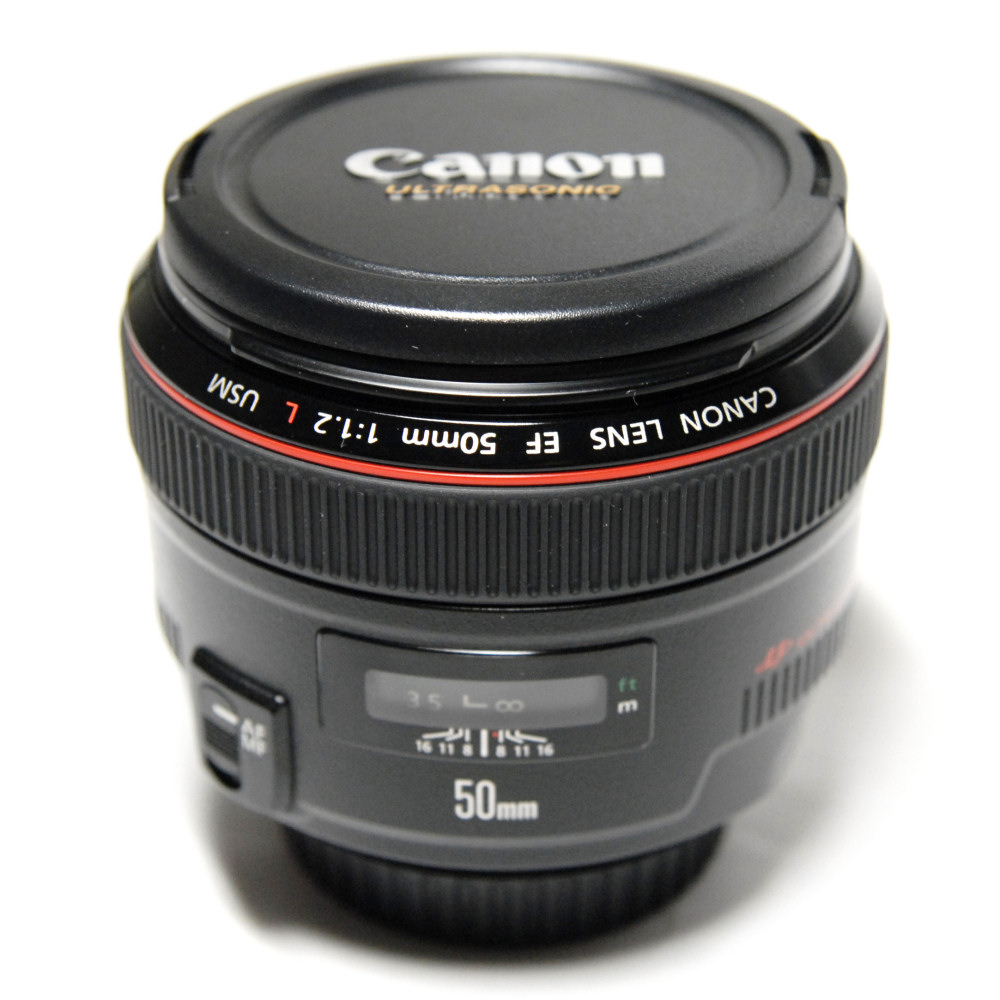 61 - Patents: 24mm f/2.8, 50mm f/1.2, 300mm f/4