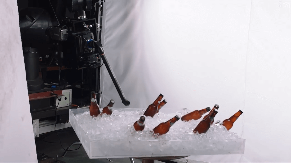 a group of brown bottles in ice description autom - Venus Optics launches the Laowa 24mm T8 2X Macro Pro2be series of Cinema Lenses